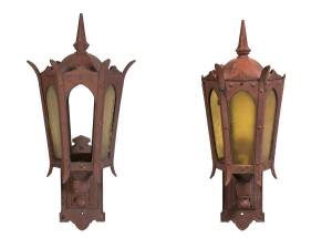 A pair of architectural wall mount lights, cast iron and glass (missing some panes), late 19th to early 20th century. 78cm each