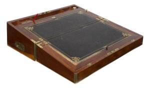 A brass bound mahogany writing slope, circa 1850s. 22cm high, 56cm wide, 28cm wide