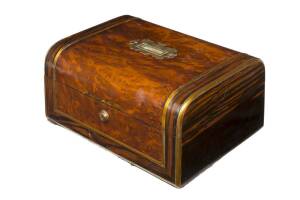 An English traveling box, rosewood and birdseye yew with brass trim, interior with unusual fitted compartments, mid 19th century. 15cm high, 30.5cm wide, 23cm deep