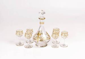 A Venetian glass decanter and matching set of 6 glasses, early to mid 20th Century. 20cm