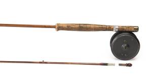 HARDY BROTHERS: "The Uniqua" fly fishing reelwith Hardy 2 piece split cane rod in Hardy canvas sleeve, plus metal cargo case.