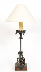 A wrought iron Spanish style table lamp. 107cm high incuding shade 