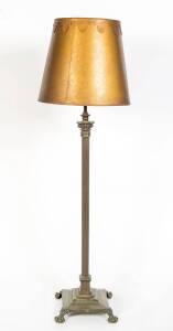 A corinthium column brass standard lamp. Approximately 170cm high with shade