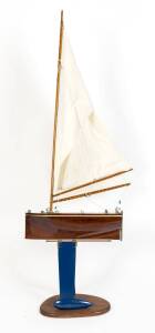 A model pond yacht on stand. haul 48cm long, 153cm high. 