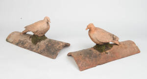 A pair of terracotta dove form roof finials, French 19th Century