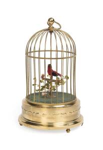 An antique Karl Griesbaum singing caged bird with automaton. 28cm high. 