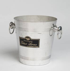 A French metal wine cooler labelled "Champagne Gilbert Leroux"