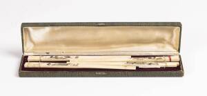 A boxed set of four pairs of Chinese ivory chopsticks, early 20th century. 