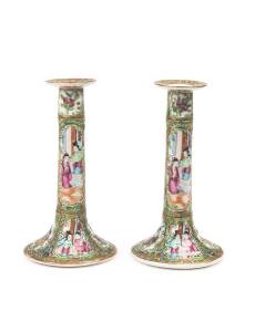 A pair of Chinese export porcelain "Canton Famille-rose" candle sticks, 19th century, 20cm high