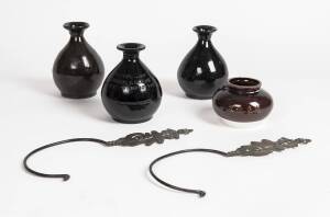 Chinese pottery bottles (2), pottery jar, glass whiskey bottle and Chinese lantern hooks (2), 19th and 20th century. (6 items)