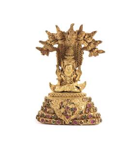 An impressive gold Buddha in the late Sokuthai or early Ayutthaya style, inlaid with coloured glass, showing Burmese influences. 8cm, weight 146 grams