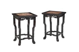 A pair of Chinese carved timber occasional tables with marble tops, early 20th century.