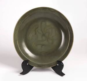 A large Longquan celadon dish, Yuan Dynasty (1271-1368), with incised lotus flower decorated in the interior, 39cm diameter