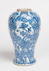 A Chinese blue and white porcelain ovoid vase, Kangxi mark to the base, late 19th century. 38cm