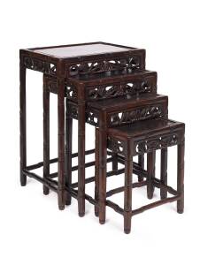 A nest of 4 Chinese carved rosewood tables, 20th Century. Largest 69cm high, 49cm wide, 35cm deep. 