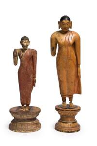 Two Sri Lankan Buddha statues, polychrome lacquer on carved wood, 18th/19th century. Tallest 38cm 