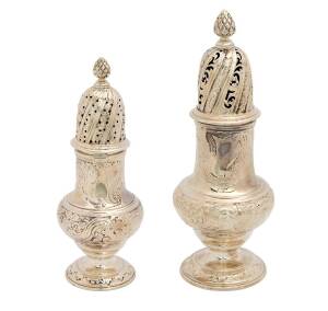 A pair of George II sterling silver sugar caster by Samuel Wood, London, 1745. 18cm & 15cm.  