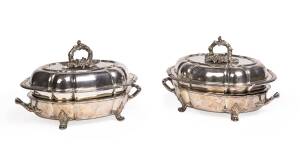 A pair of fine English silver plated tureens, 19th century. 35cm across the handles