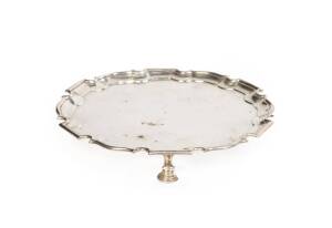 An early 18th century English sterling silver salver, marks illegible. 19cm diameter