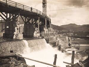 Group of 9 albumen photographs of an Australian dam construction, each mounted on brown card, early 20th century. Photo size 15.5 x 20.5cm