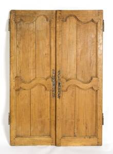 A pair of French cherrywood armoire doors, 19th century. 155cm high, 119cm wide (together)