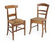 Two antique French cherrywood and rush seated chairs. 