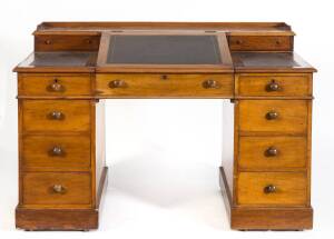 An English mahogany Dicken's desk. 94cm high, 140cm wide, 73cm deep