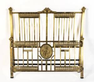An Edwardian brass double bed. 134cm high, 140cm wide