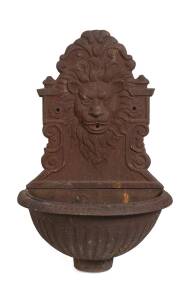 A cast iron mask and bowl wall font. 86cm high, 54cm wide, 30cm deep