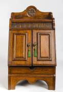 A Victorian carved oak fuel cabinet. 69cm high, 39cm wide, 41cm deep 