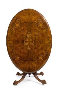 A Victorian marquetry inlaid walnut loo table
