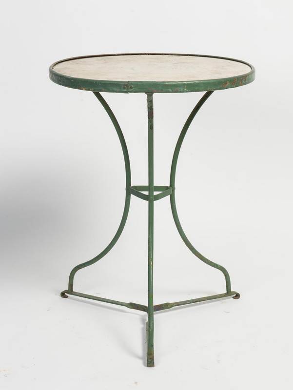 A Carrara marble and cast iron circular patio table, French, circa 1900. 72.5cm high, 55cm diameter