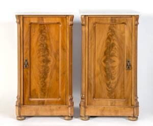 A pair of flame mahogany bedside cabinets with marble tops. 83cm high 43.5cm wide, 36cm deep