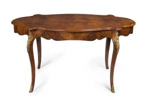 A French Louis XV style walnut centre table with ormolu mounts, 19th century. 73cm high, 138cm wide, 83cm deep. 