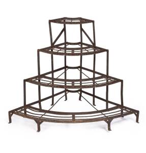 A French garden corner plant stand, riveted iron, 19th Century. 87cm high, 11cm wide. 
