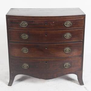 An English mahogany string inlaid bow front chest, 19th century. 83cm high, 85cm wide, 50cm deep.