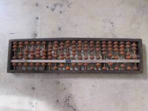 A large antique abacus. 120 x 27cm