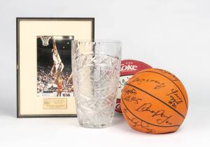 Signed Basketballs (2) - one signed by Melbourne Tigers, other by Brisbane Bullets; plus 1991 Sydney Kings MVP glass trophy awarded to Dwayne McClain.