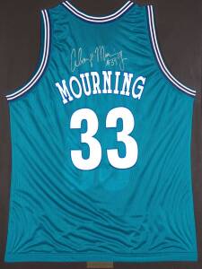 ALONZO MOURNING, signature on Charlotte Hornets basketball singlet, framed & glazed, overall 71x92cm. With CoA.