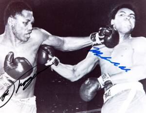 MUHAMMAD ALI v JOE FRAZIER, display comprising action photograph signed by both fighters, window mounted, framed & glazed, overall 36x30cm. With CoA.