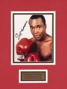 SIGNED DISPLAYS: Evander Holyfield & Sugar Ray Leonard signed photographs, both window mounted, framed & glazed, largest 60x70cm. Both with CoAs. - 2