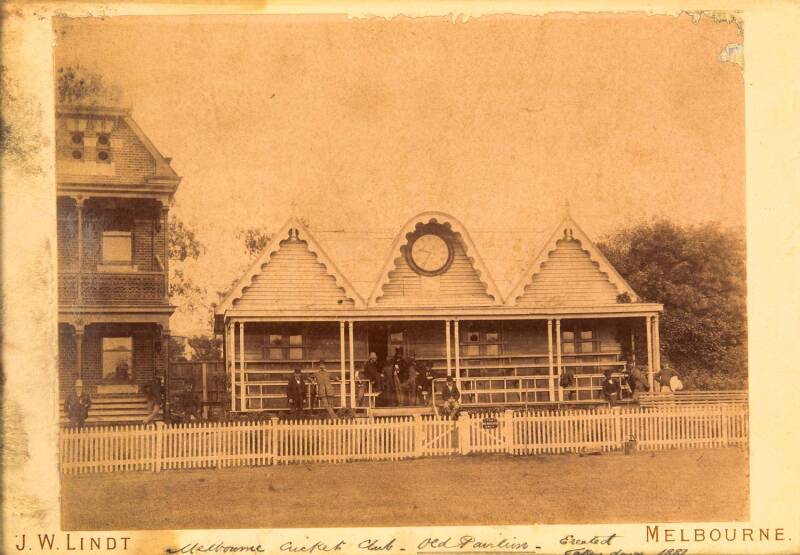 MELBOURNE CRICKET GROUND: Original albumen photograph on J.W.Lindt, Melbourne mount, endorsed "Melbourne Cricket Club - Old Pavilion, Erected   , Taken down 1881", framed & glazed, overall 28x20cm.