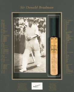 DON BRADMAN, display comprising signature on piece, window mounted with miniature bat & photograph, framed & glazed, overall 58x70cm.