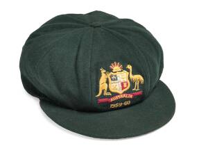 NORM O'NEILL'S AUSTRALIAN "BAGGY GREEN" TEST CAP, green wool, embroidered Australian Coat-of-Arms & "1959-60" on front, Farmer's label inside marked "9/59 N.O'Neill". Provenance: Ex Sid O'Linn (South Africa 7 Tests 1960-61). [Norman O'Neill played 42 Test