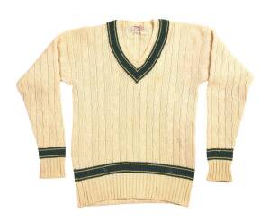 TOM VEIVERS' AUSTRALIAN TEST JUMPER, long sleeves, cream wool with green & gold trimmings, with name tag "T.Veivers"; together with signed photograph. [Tom Veivers played 21 Tests 1963-67].