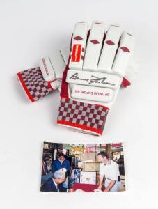 SIR GARFIELD SOBERS: Pair of "Gray-Nicolls" batting gloves, one signed by Gary Sobers. With photo of Sobers signing.