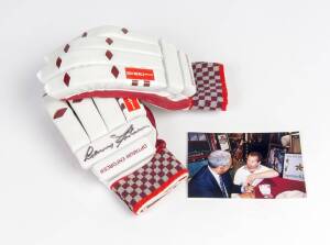 SIR GARFIELD SOBERS: Pair of "Gray-Nicolls" batting gloves, one signed by Gary Sobers. With photo of Sobers signing.