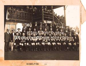 COLLINGWOOD: Team photograph showing the team in their jumpers at Hamilton in 1913. Mount poor, though photograph fine.