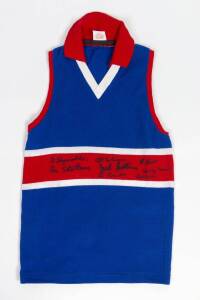 FOOTSCRAY/WESTERN BULLDOGS: Footscray jumper embroidered on reverse with details of Footscray's 1954 Premiership Team, with 12 signatures, noted Charlie Sutton, Jack Collins & Wally Donald.