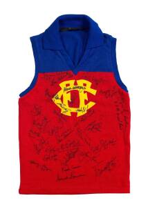 FITZROY/BRISBANE LIONS: Fitzroy jumper signed on Fitzroy Team of our Century 1897-1996 night, with c33 signatures including Kevin Murray, Paul Roos, Bill Stephen & Haydn Bunton Jr; plus 3 "Team of our Century" menu/programmes & old football with c33 signa